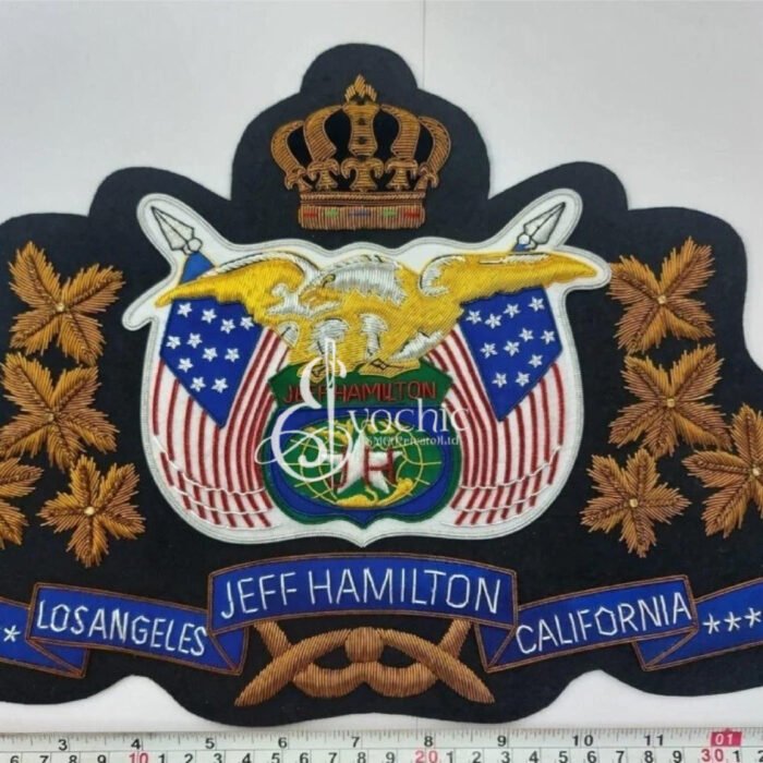Handmade gold bullion badge of Jeff Hamilton Los Angeles California crest with US eagle and crown.
